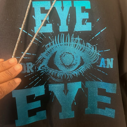 AN EYE FOR AN EYE HOODED SWEATSHIRT