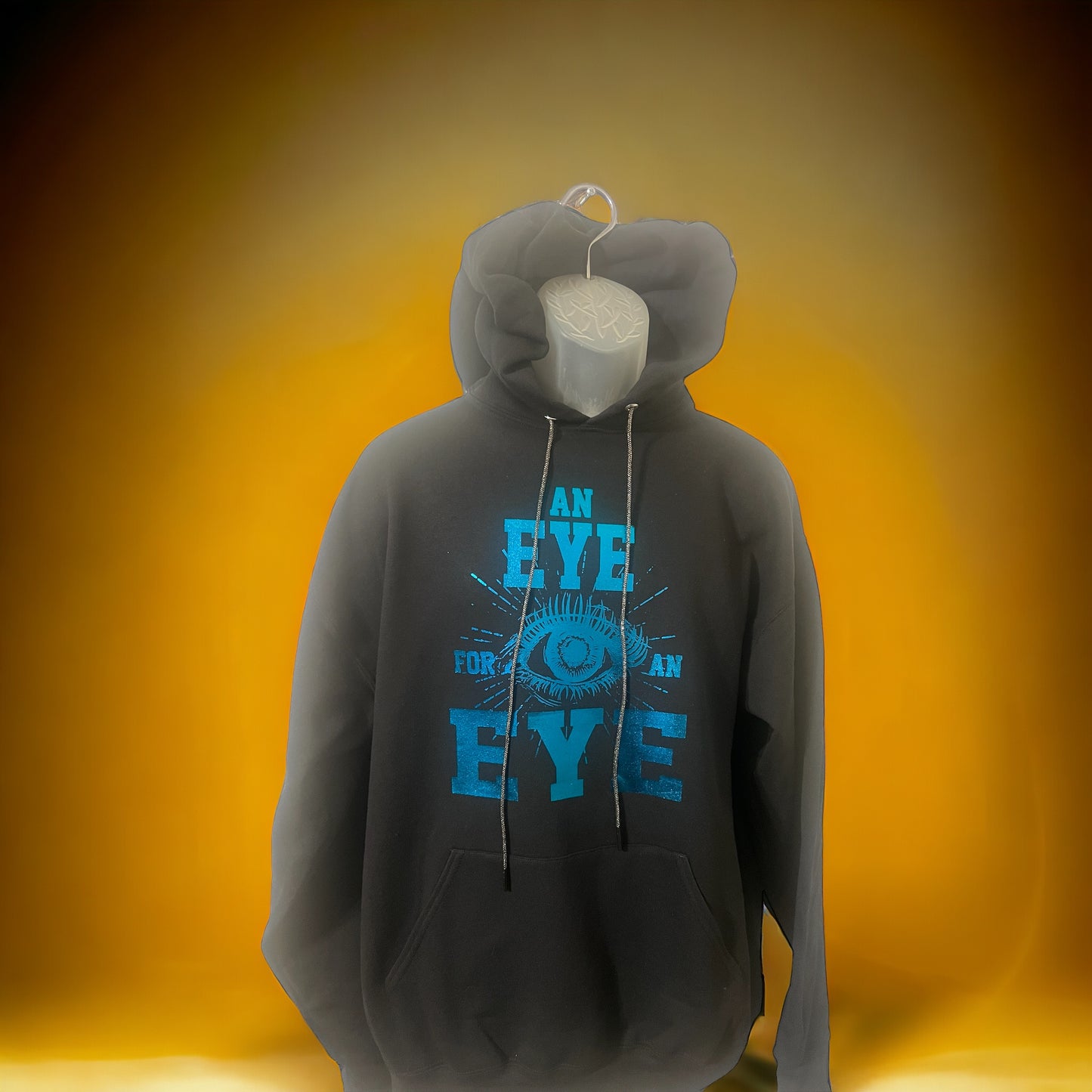 AN EYE FOR AN EYE HOODED SWEATSHIRT